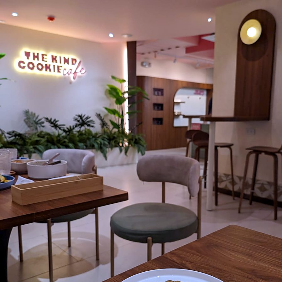 Dining area with the lit café sign