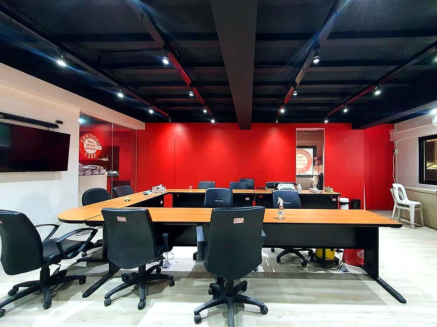 Meeting room with red feature wall