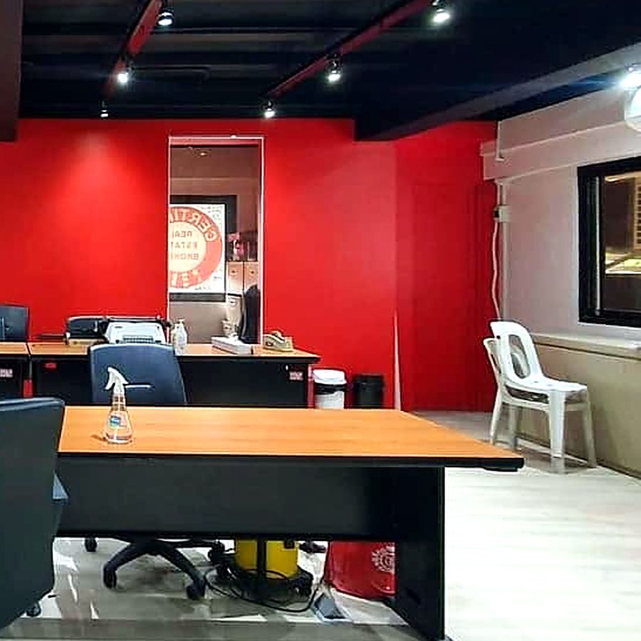 Red wall with the association emblem